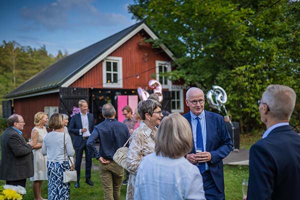 A group of people at a summer garden party